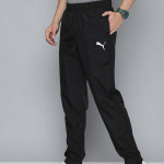 PUMA Men Black Brand Logo Printed Woven Track Pants